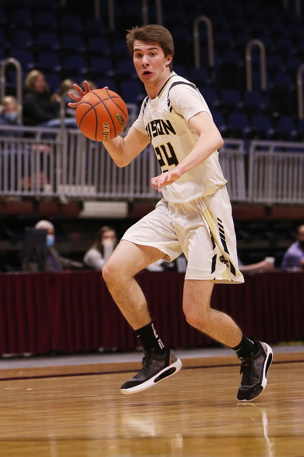 Colby Bessler dribbles quick before moving into center court